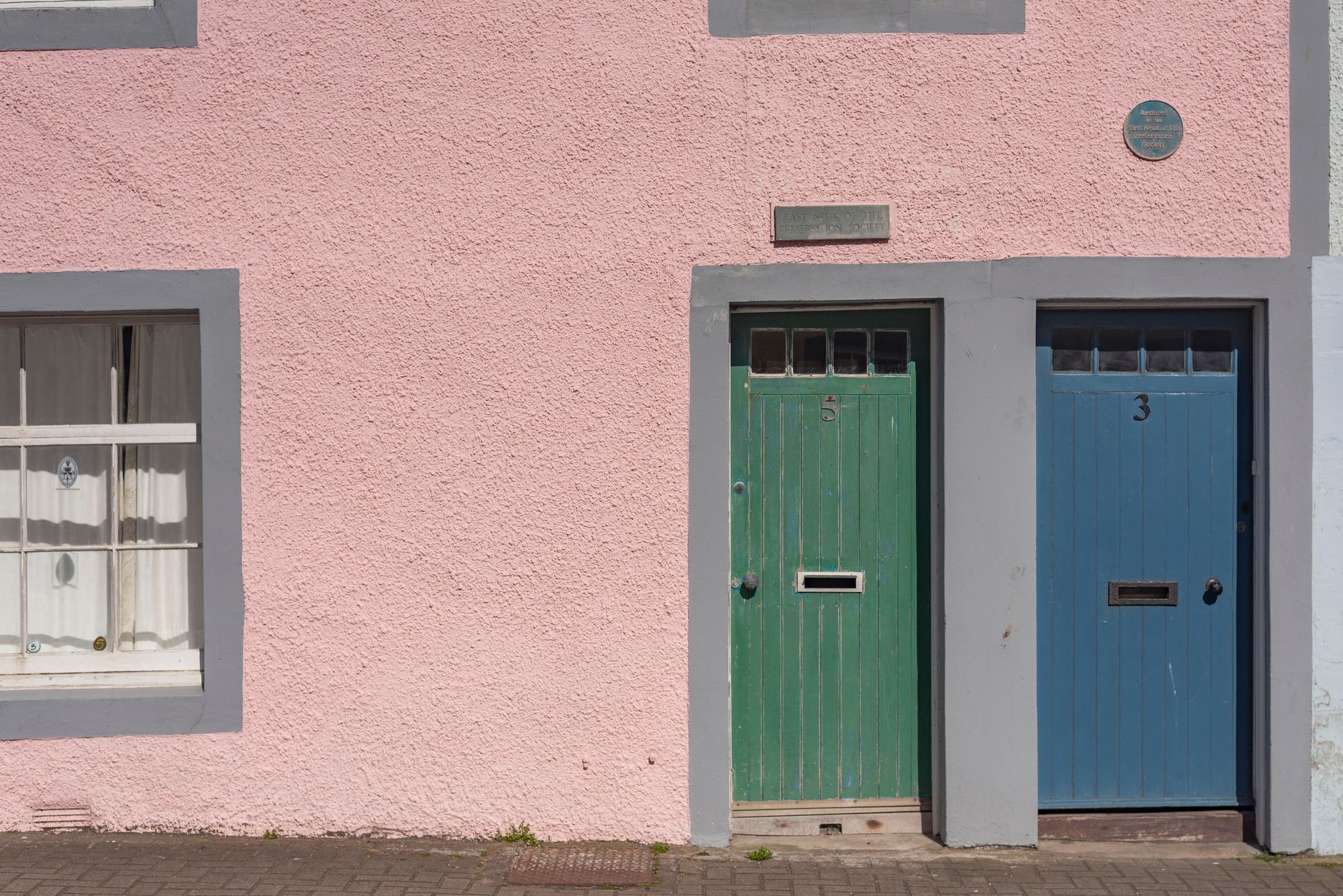 Coloured front doors on a Scottish street