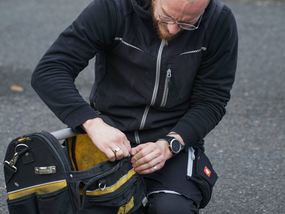 One of the team opening his tool bag